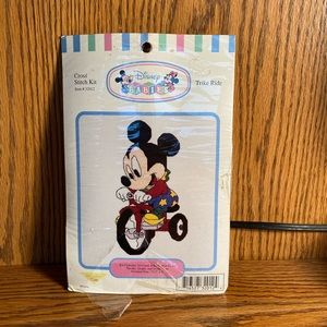 Disney Babies cross stitch kit. Trike Ride 7 1/2 x 4.